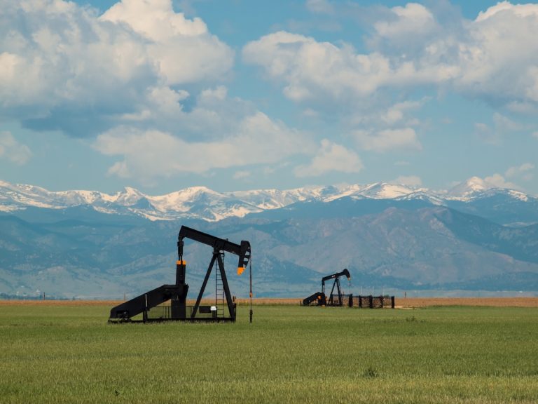 Pumpjack on agricultural field in Colorado.